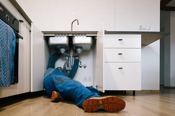 Professional Emergency Plumber technician working in Fulton, KY